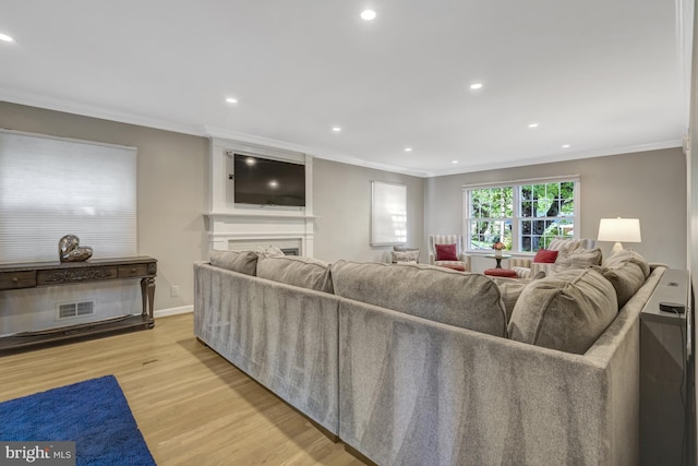 3313 Midland Rd, Fairfax, VA 22031 - living room with visible vents, a fireplace, wood finished floors, ornamental molding, and recessed lighting