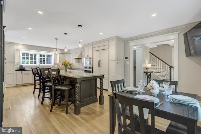 3313 Midland Rd, Fairfax, VA 22031 - dining area featuring recessed lighting, stairway, and light wood-type flooring