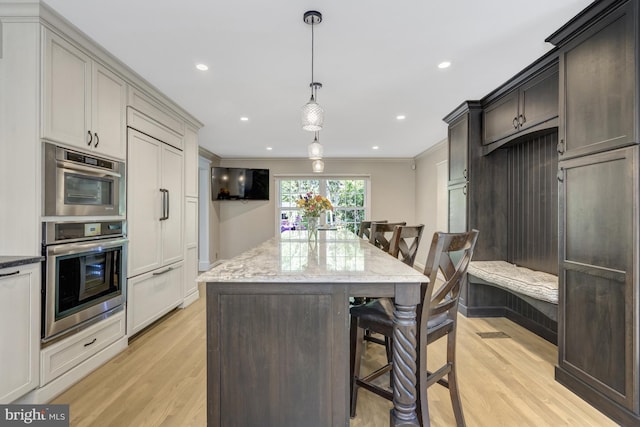 3313 Midland Rd, Fairfax, VA 22031 - kitchen featuring crown molding, light wood finished floors, double oven, and paneled fridge
