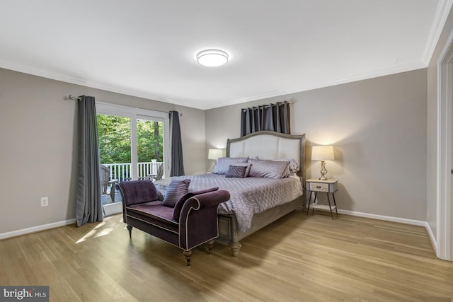 3313 Midland Rd, Fairfax, VA 22031 - bedroom featuring baseboards, ornamental molding, light wood finished floors, and access to exterior