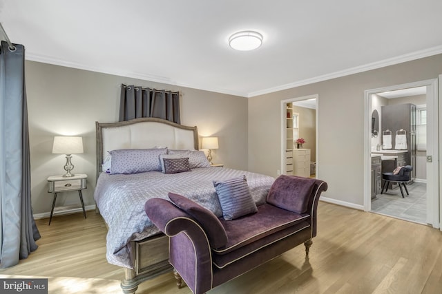 3313 Midland Rd, Fairfax, VA 22031 - bedroom with baseboards, ornamental molding, ensuite bath, and wood finished floors