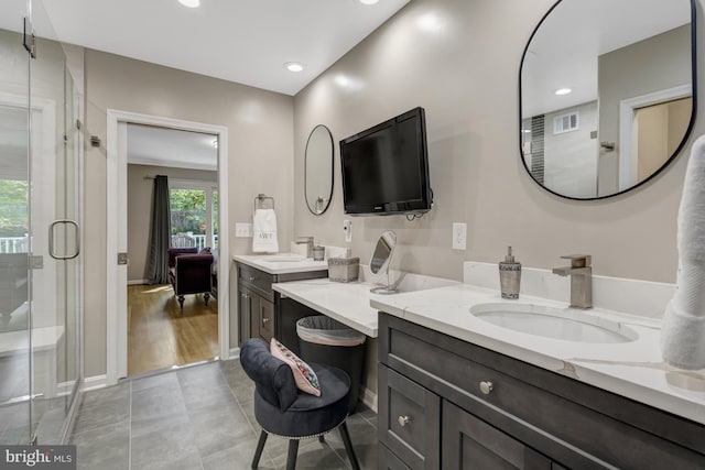 3313 Midland Rd, Fairfax, VA 22031 - full bathroom featuring visible vents, a shower stall, vanity, baseboards, and recessed lighting