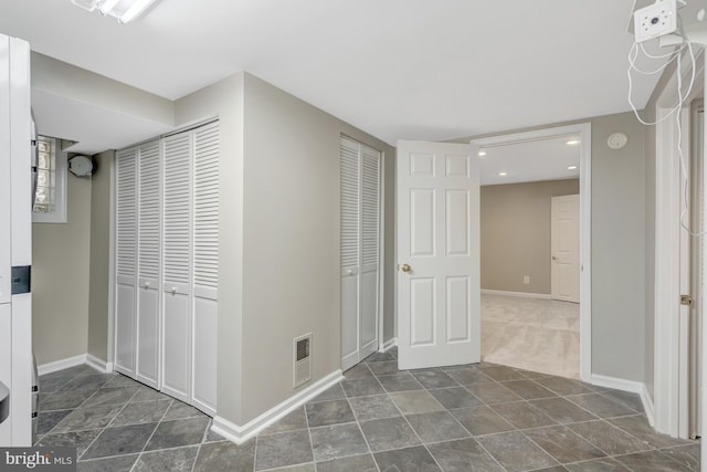 3313 Midland Rd, Fairfax, VA 22031 - hallway featuring visible vents, recessed lighting, baseboards, and stone finish floor
