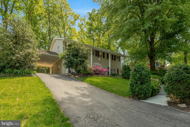 3313 Midland Rd, Fairfax, VA 22031 - split foyer home featuring a carport, driveway, and a front yard