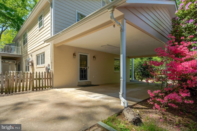 3313 Midland Rd, Fairfax, VA 22031 - exterior space with concrete driveway, fence, and an attached carport