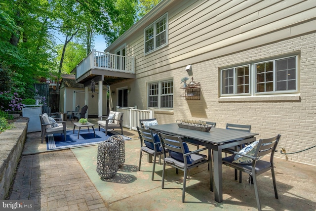 3313 Midland Rd, Fairfax, VA 22031 - view of patio / terrace with an outdoor living space, a balcony, and outdoor dining space