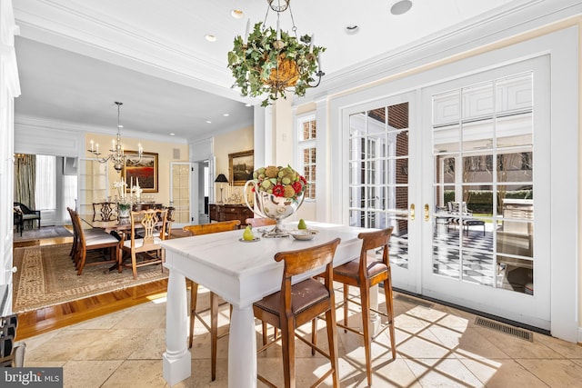 24 Whitfield Rd, Baltimore, MD 21210 - dining room featuring visible vents, crown molding, recessed lighting, french doors, and an inviting chandelier