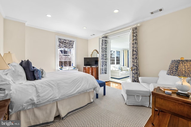24 Whitfield Rd, Baltimore, MD 21210 - bedroom with visible vents, recessed lighting, crown molding, and wood finished floors