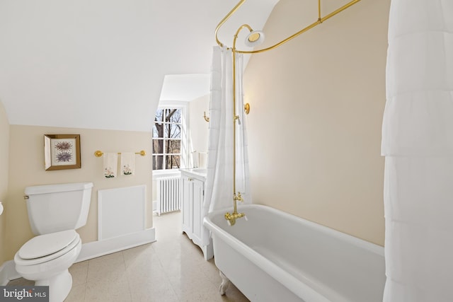 24 Whitfield Rd, Baltimore, MD 21210 - full bath featuring toilet, lofted ceiling, and a freestanding tub
