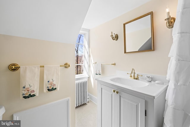 24 Whitfield Rd, Baltimore, MD 21210 - bathroom featuring vanity and radiator heating unit
