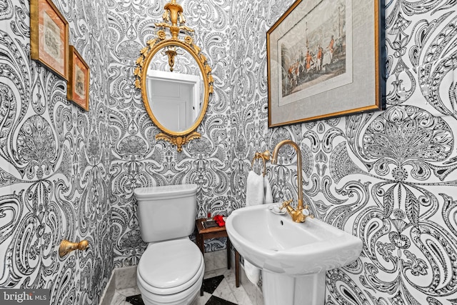 24 Whitfield Rd, Baltimore, MD 21210 - half bath featuring toilet and a sink
