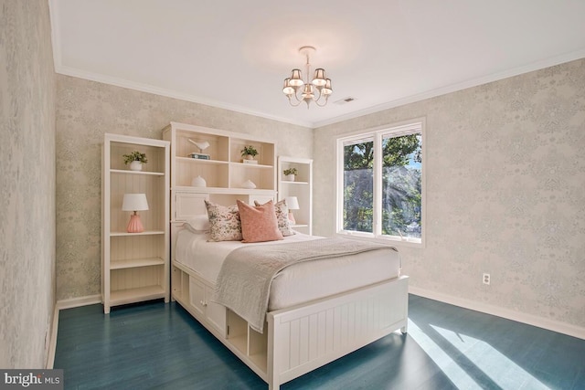 bedroom with a chandelier, dark wood-type flooring, wallpapered walls, baseboards, and crown molding