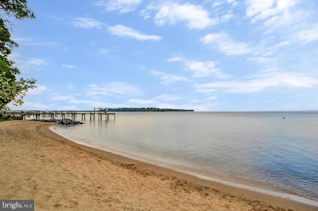 water view with local beach and a dock