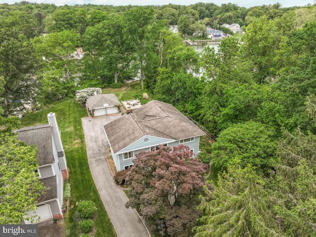 view from above of property with a forest