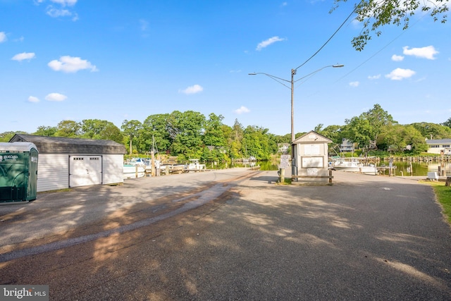 743 Rolling View Dr, Annapolis, MD 21409 - view of asphalt road with street lights