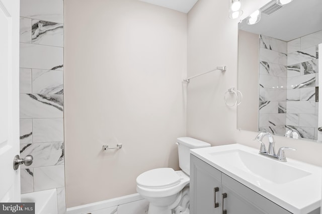 738 N Patterson Park Ave, Baltimore, MD 21205 - bathroom featuring visible vents, toilet, marble finish floor, baseboards, and vanity