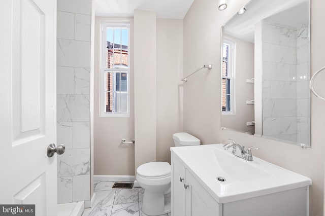 738 N Patterson Park Ave, Baltimore, MD 21205 - full bath featuring visible vents, baseboards, toilet, marble finish floor, and vanity