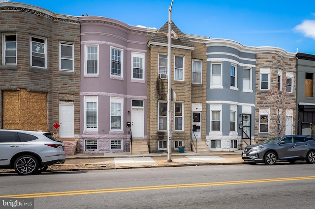 738 N Patterson Park Ave, Baltimore, MD 21205 - view of front of property with stone siding and entry steps