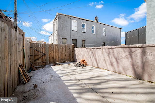 738 N Patterson Park Ave, Baltimore, MD 21205 - view of patio with a gate and fence