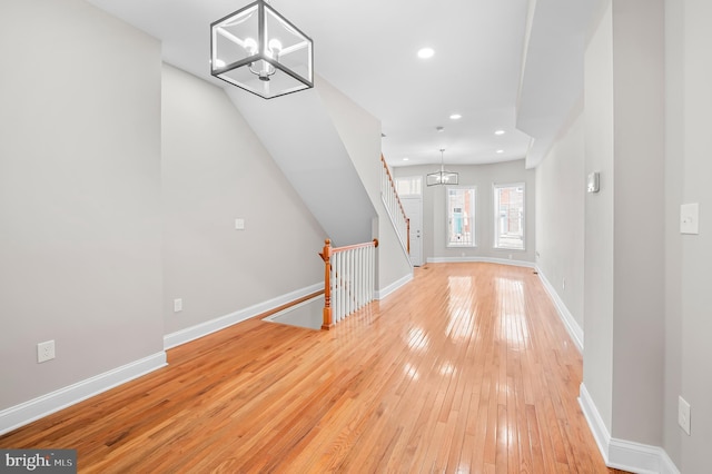 738 N Patterson Park Ave, Baltimore, MD 21205 - interior space featuring a notable chandelier, recessed lighting, light wood-type flooring, and baseboards