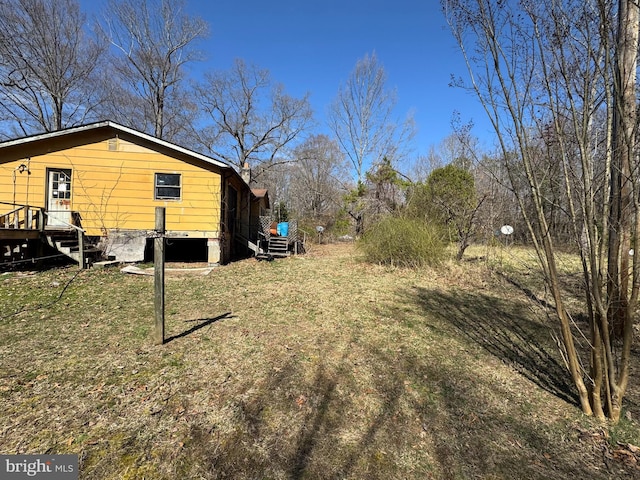 view of yard featuring a deck