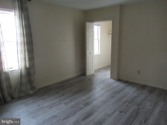empty room featuring wood finished floors