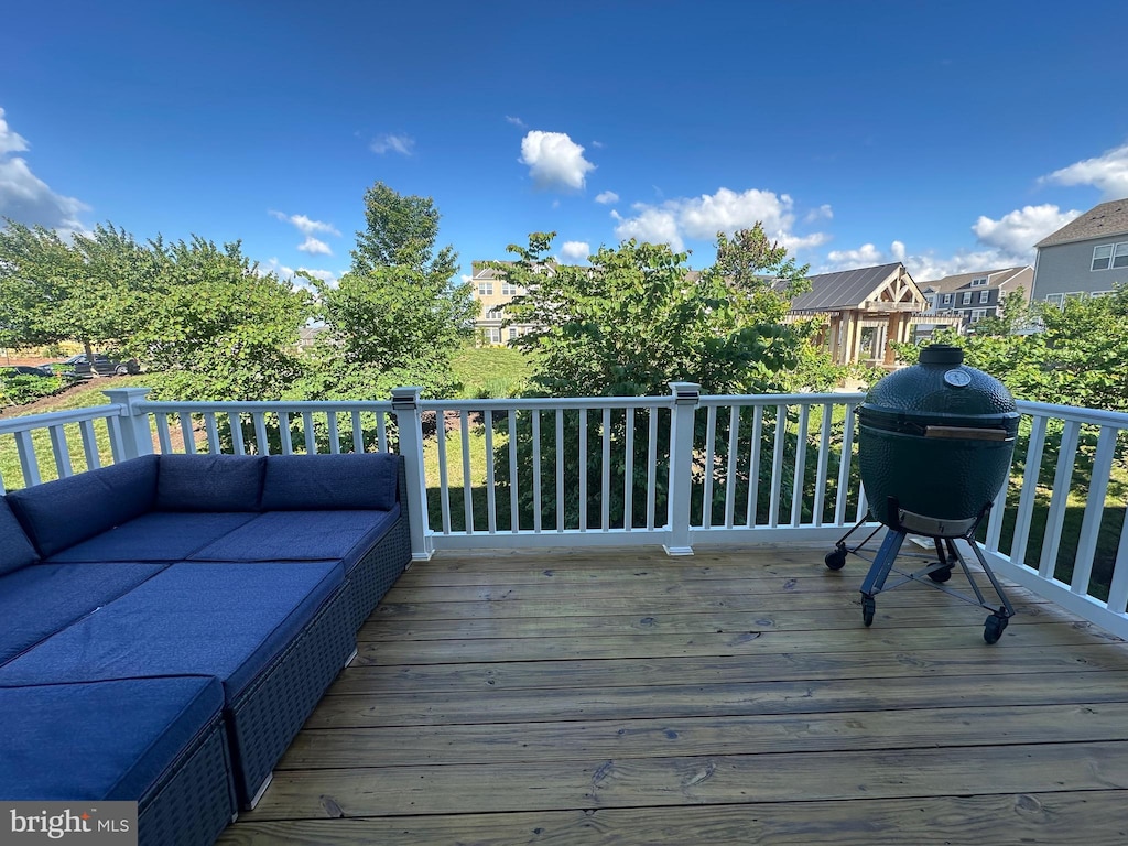 6210 Quinns Creek Dr, Haymarket, VA 20169 - wooden deck featuring outdoor lounge area