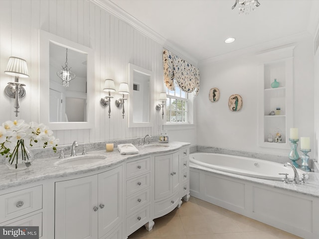 bathroom featuring tile patterned flooring, a bath, crown molding, and a sink