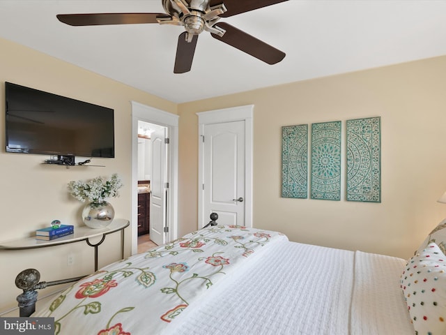 bedroom featuring connected bathroom and ceiling fan