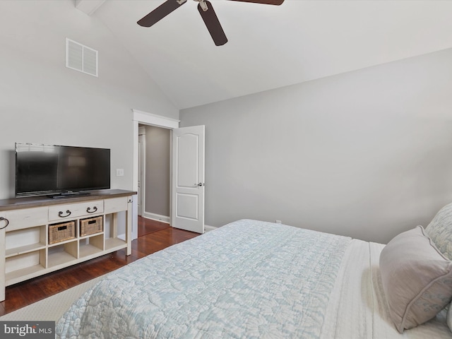 bedroom with visible vents, high vaulted ceiling, a ceiling fan, dark wood finished floors, and baseboards