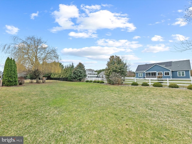 view of yard featuring fence