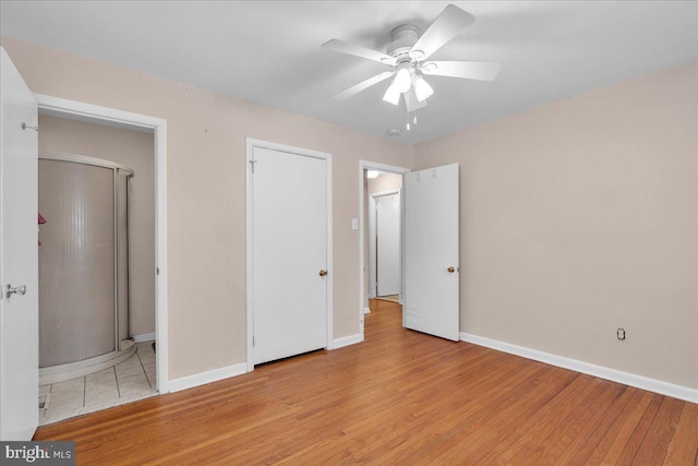 119 Rieck Ave, Millville, NJ 08332 - unfurnished bedroom featuring baseboards, light wood-style floors, and a ceiling fan