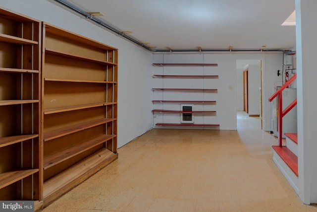 below grade area with tile patterned floors