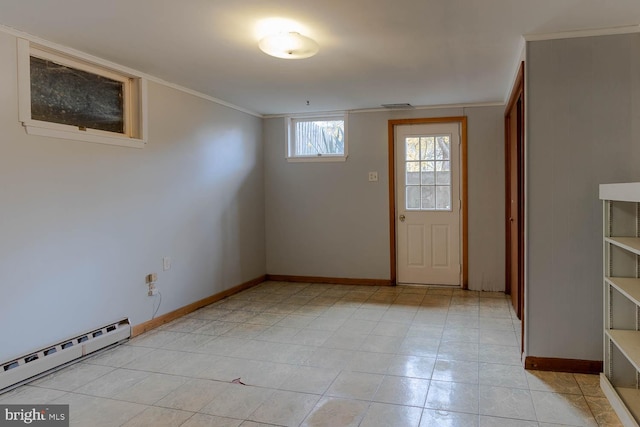 entryway featuring baseboard heating, baseboards, ornamental molding, light tile patterned floors, and visible vents