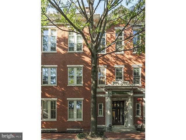1023 Clinton St Unit 204, Philadelphia, PA 19107 - view of front of house featuring brick siding