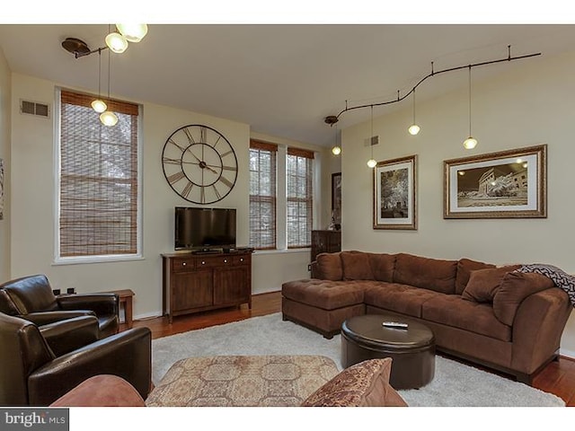 1023 Clinton St Unit 204, Philadelphia, PA 19107 - living room with visible vents, wood finished floors, and baseboards