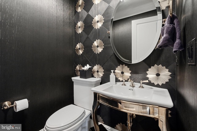 bathroom featuring toilet
