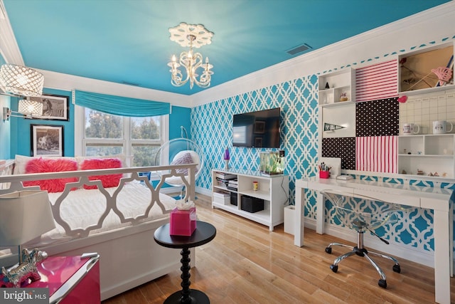 bedroom with visible vents, baseboards, a chandelier, ornamental molding, and wallpapered walls