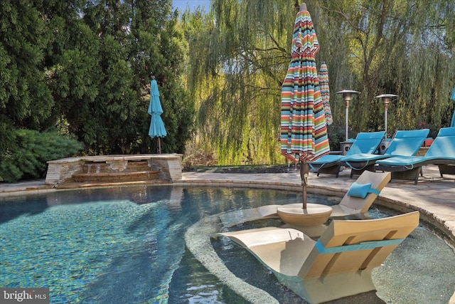 pool featuring a patio
