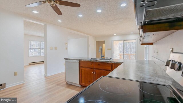 159 Yancey Ct, Mc Gaheysville, VA 22840 - kitchen featuring a baseboard heating unit, ceiling fan, dishwasher, brown cabinets, and a sink