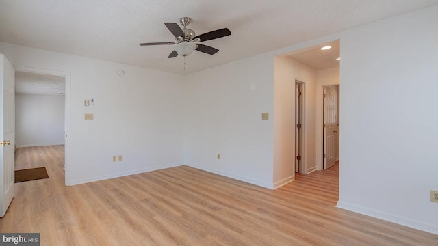 159 Yancey Ct, Mc Gaheysville, VA 22840 - unfurnished room with a ceiling fan, baseboards, light wood-type flooring, and a textured ceiling