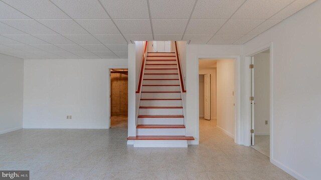 159 Yancey Ct, Mc Gaheysville, VA 22840 - stairs featuring a drop ceiling and baseboards