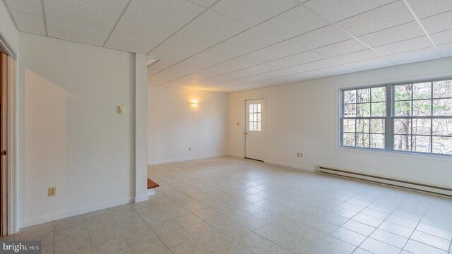 159 Yancey Ct, Mc Gaheysville, VA 22840 - unfurnished room featuring baseboard heating, a paneled ceiling, and baseboards