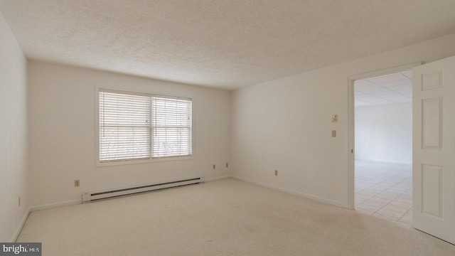 159 Yancey Ct, Mc Gaheysville, VA 22840 - carpeted empty room with a baseboard heating unit, baseboards, and a textured ceiling