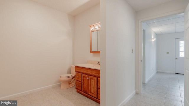 159 Yancey Ct, Mc Gaheysville, VA 22840 - interior space with a drop ceiling, toilet, vanity, and baseboards