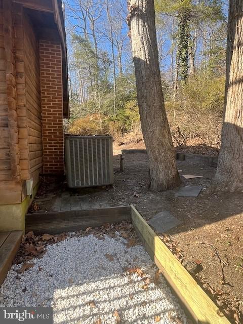 view of yard featuring central AC