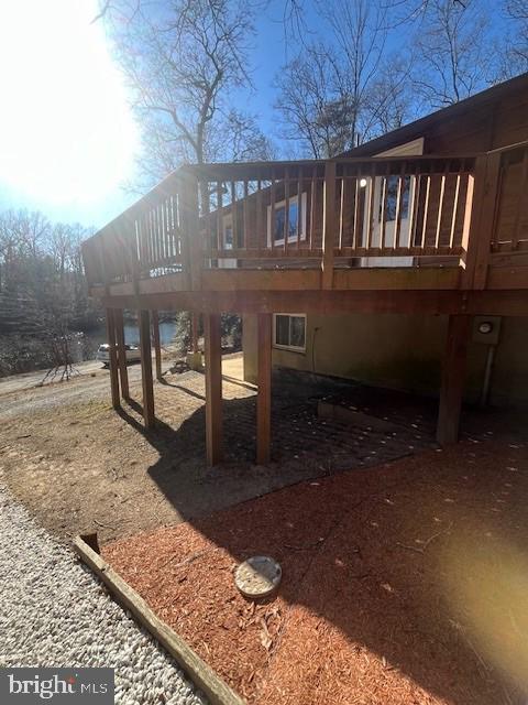 exterior space featuring a wooden deck
