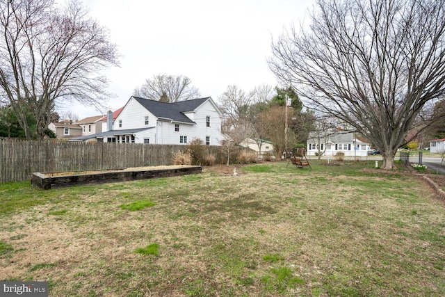 view of yard featuring fence