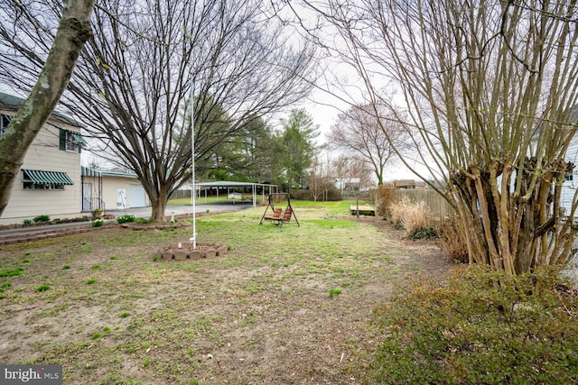 view of yard featuring fence