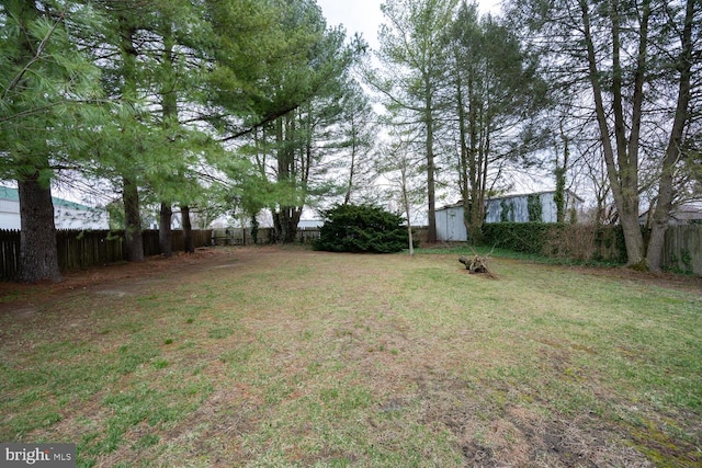 view of yard featuring a fenced backyard